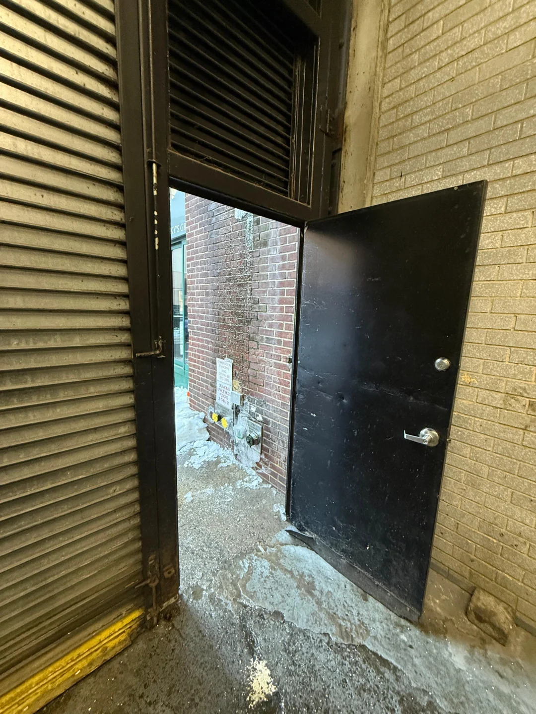 Exterior door and frame inspected for latch misalignment in NYC